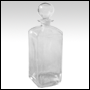 Rectangular clear glass bottle with glass stopper.  Capacity: 12oz (336ml)