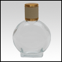 Circle Shaped Clear Glass Bottle with Ivory Leather-type cap. Capacity: 52 ml (about 2oz) at neck.