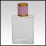 Elegant Clear glass bottle with Pink Leather-type cap. Capacity: 61 mL (~2.06 oz).  