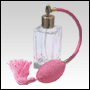 Empire glass bottle with Pink Bulb sprayer with tassel and golden fitting. Capacity: 1 2/3oz (50ml)