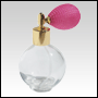 Round glass bottle with Pink Bulb sprayer and golden fitting. Capacity: 2 2/3oz (7
