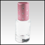 Clear roll-on tulip shaped bottle with pink cap. Pink cap with Dots. Capacity: 6 ml (1/5 oz)