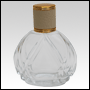 Clear Tiara glass bottle with Ivory Leather-type screw on cap. Capacity: 54 mL (~1.82 oz) at neck. 
