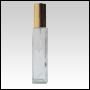Slim glass bottle with Gold sprayer top. Capacity: 3.57oz (100 ml)